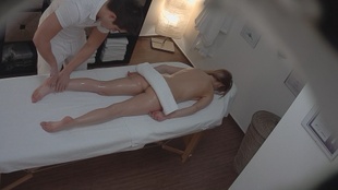 6. Download full pics of Brunette Babe Takes It Hard on the Massage Table from czechmassage.com