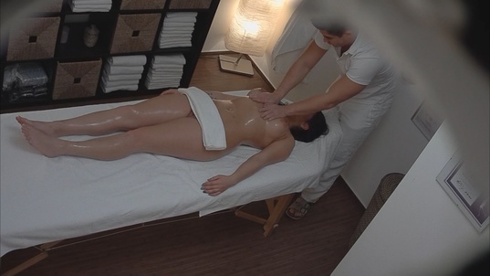 8. Download full pics of Busty brunette gets the massage of her dreams from czechmassage.com