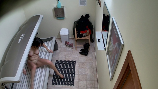 6. Download full pics of Brunette Starts Playing With Her Pussy in Solarium from czechsolarium.com