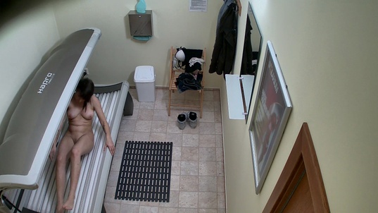 3. Download full pics of Dark-Haired Babe Strips Down and Flashes Her Pussy from czechsolarium.com