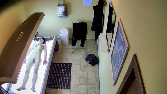 4. Download full pics of Busty MILF Lets Her Massive Tits Hang Free from czechsolarium.com