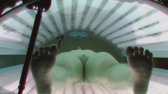 4. Download full pics of Dark-Haired Babe Strips Again in Solarium from czechsolarium.com