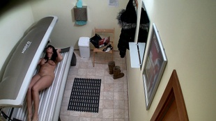 3. Download full pics of Mysterious Lady Strips in Solarium from czechsolarium.com