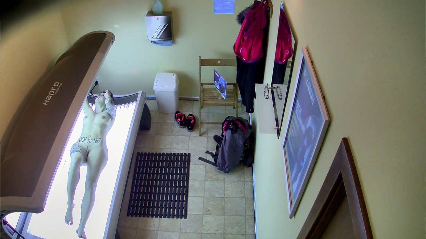 Goth Slut Strips Down in Solarium