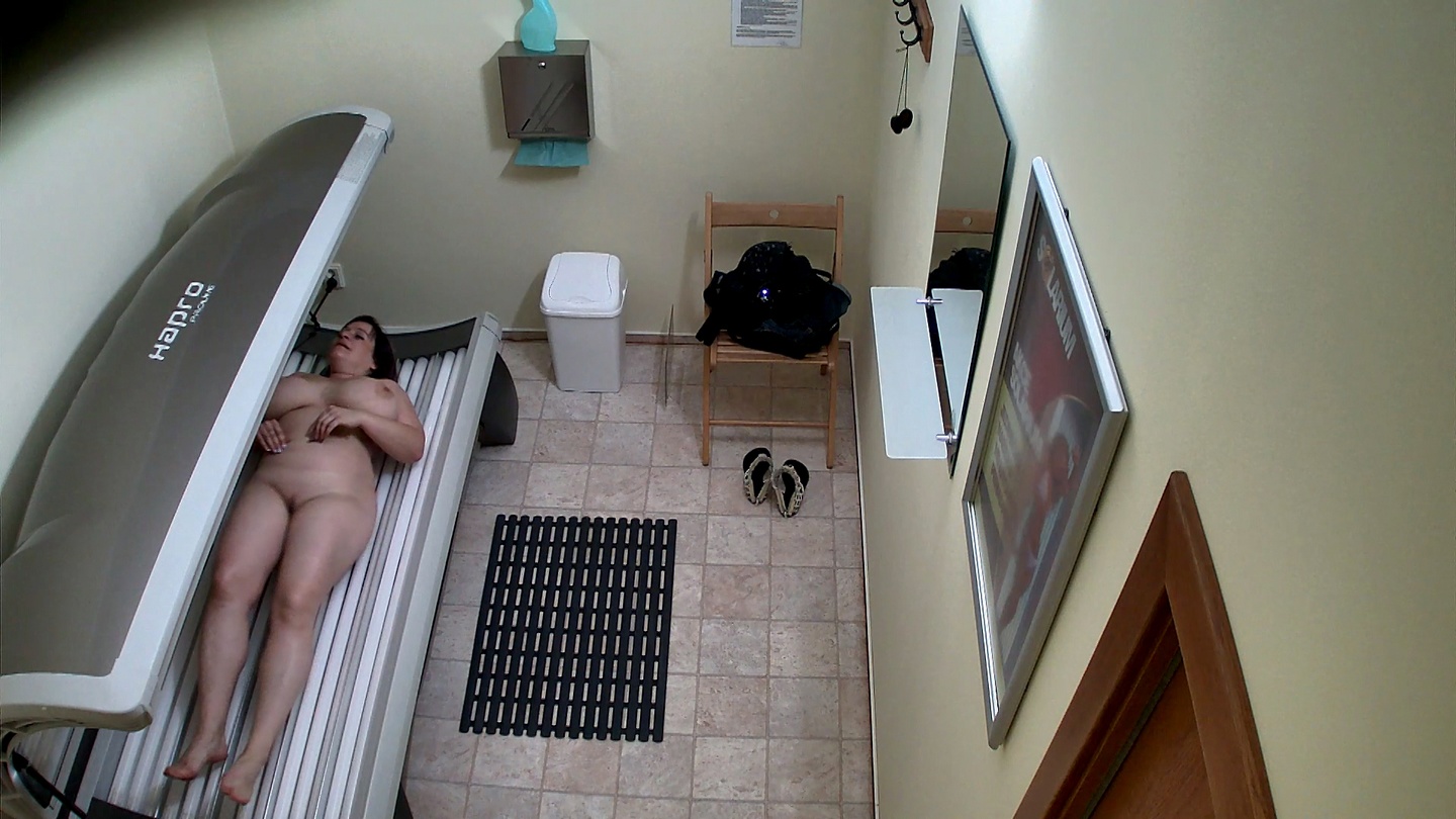 MILF With Huge Tits Strips Down in Solarium