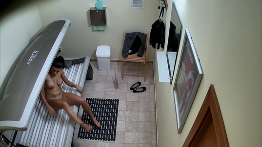 3. Download full pics of Busty Model Masturbates in Solarium from czechsolarium.com