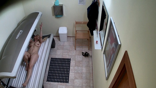 3. Download full pics of MILF With Massive Tits Bares All in Solarium from czechsolarium.com