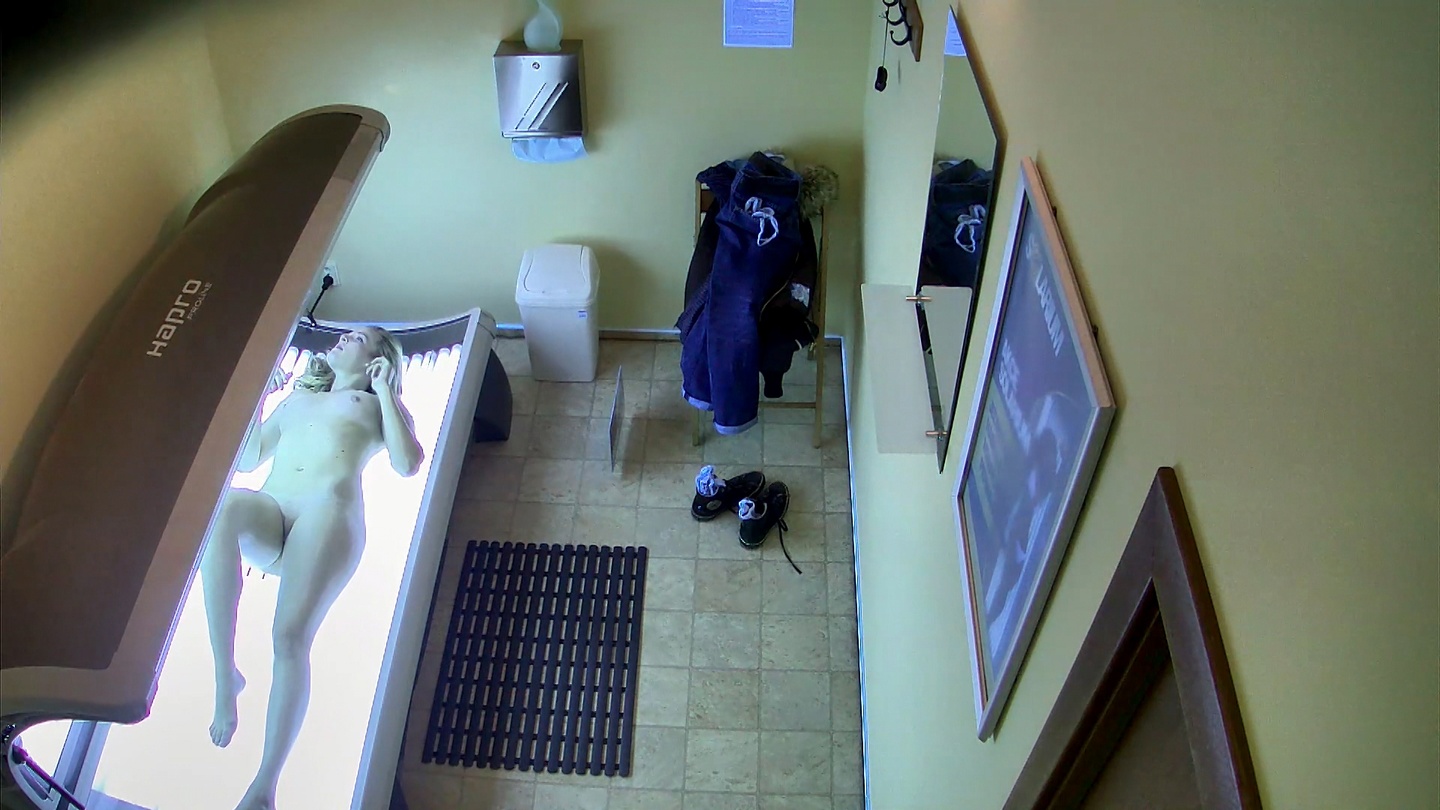 Blonde Babe Strips Again in Solarium