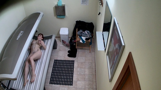 3. Download full pics of Blonde Teases Cameras in Solarium from czechsolarium.com