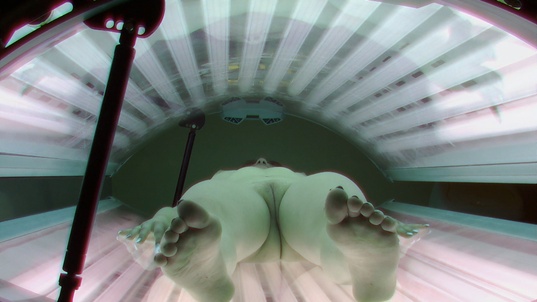 4. Download full pics of Blonde Teases Cameras in Solarium from czechsolarium.com