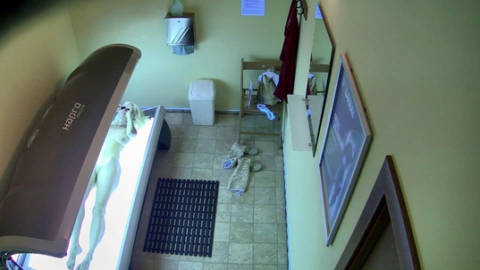 6. Download full pics of Busty Housewife Masturbates in Solarium from czechsolarium.com