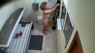 2. Download full pics of Shaved Beauty Steals the Show from czechsolarium.com