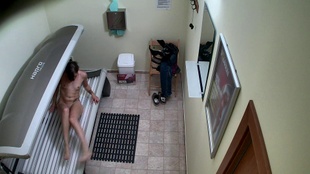 3. Download full pics of Brunette's Sun-Kissed Strip Tease from czechsolarium.com