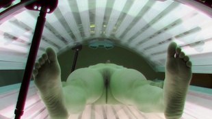 4. Download full pics of Brunette's Sun-Kissed Strip Tease from czechsolarium.com