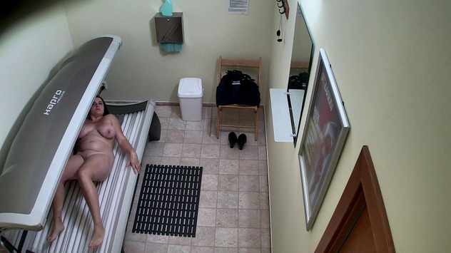 Busty Babe's Steamy Solarium Show