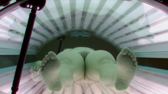 4. Download full pics of Brunette Beauty Basks in the Sun from czechsolarium.com