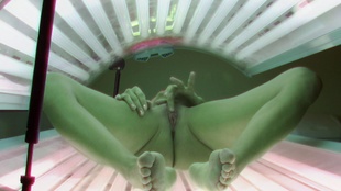 4. Download full pics of Red MILF Rubbing Herself in Solarium from czechsolarium.com