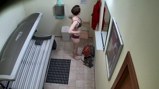 2. Download full pics of Young Brunette in the Solarium Again from czechsolarium.com