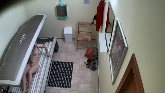 3. Download full pics of Young Brunette in the Solarium Again from czechsolarium.com