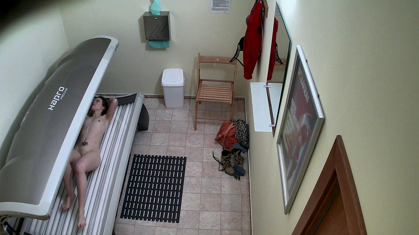 Young Brunette in the Solarium Again