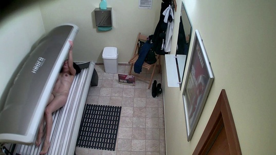 3. Download full pics of Dark-Haired Teen Lights Up the Solarium from czechsolarium.com