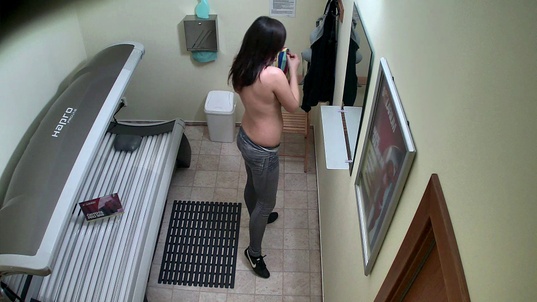 2. Download full pics of Brunette Getting a Tan in Solarium from czechsolarium.com