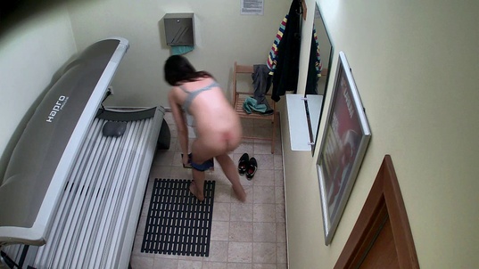 6. Download full pics of Brunette Getting a Tan in Solarium from czechsolarium.com