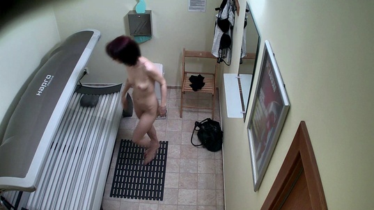 3. Download full pics of Slim Brunette's Playful Solarium Show from czechsolarium.com