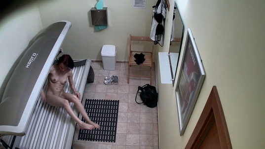 6. Download full pics of Slim Brunette's Playful Solarium Show from czechsolarium.com