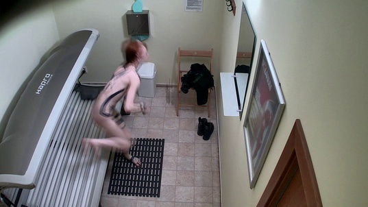 5. Download full pics of Tattooed Redhead Unwittingly Gets Filmed from czechsolarium.com