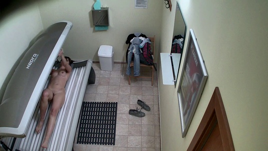 3. Download full pics of Brunette's Private Moment Exposed from czechsolarium.com