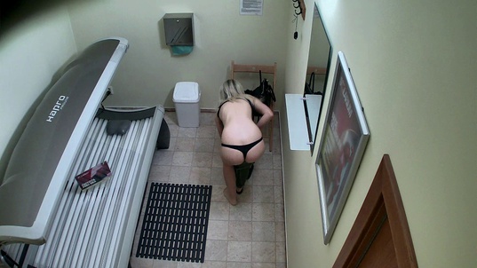 2. Download full pics of Blonde Exposed While Relaxing from czechsolarium.com