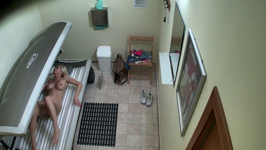 4. Download full pics of Busty MILF's Solarium Show from czechsolarium.com