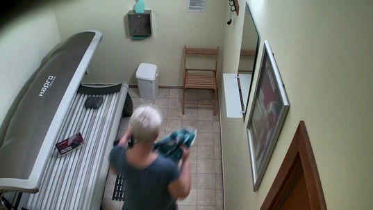 1. Download full pics of Busty Granny Exposed in the Solarium from czechsolarium.com