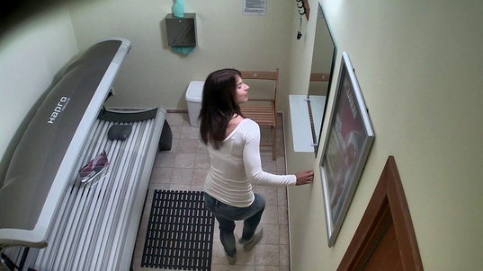 1. Download full pics of Exposed: Busty Brunette in Solarium from czechsolarium.com