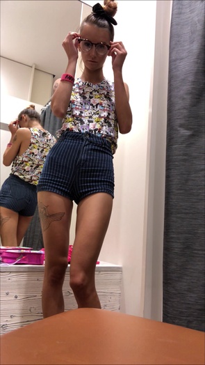 6. Download full pics of Slim Tease in the Changing Room – Skinny Slut Undresses from lifepornstories.com