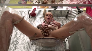 2. Download full pics of Sash Beart Pukes on Glass Table from powerfetish.com