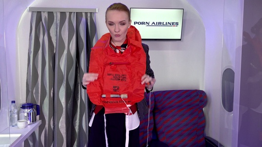 4. Download full pics of Stewardess: Mile High Club from nudz.com